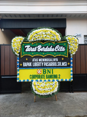 Papan Bunga Duka di Idi Tunong