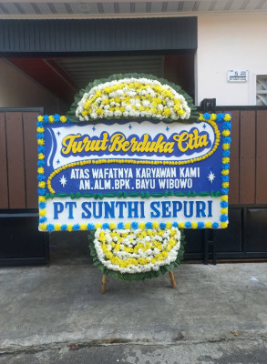 Papan Bunga Duka di Idi Tunong