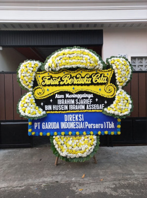 Papan Bunga Duka di Idi Tunong