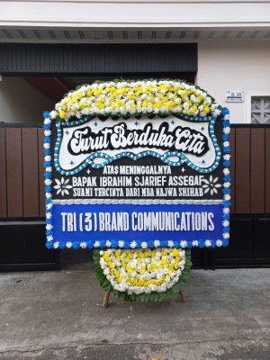 Papan Bunga Duka di Idi Tunong